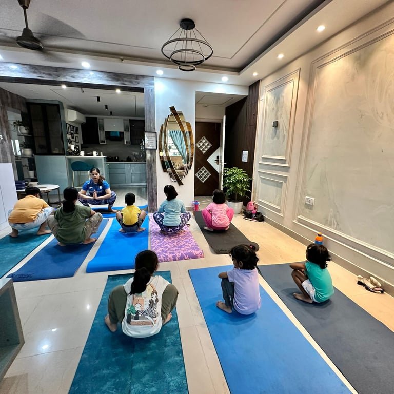 Kids sitting in Malasana